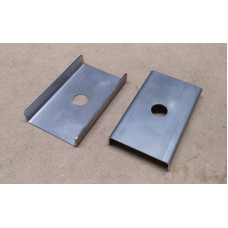 Leaf spring location plates
